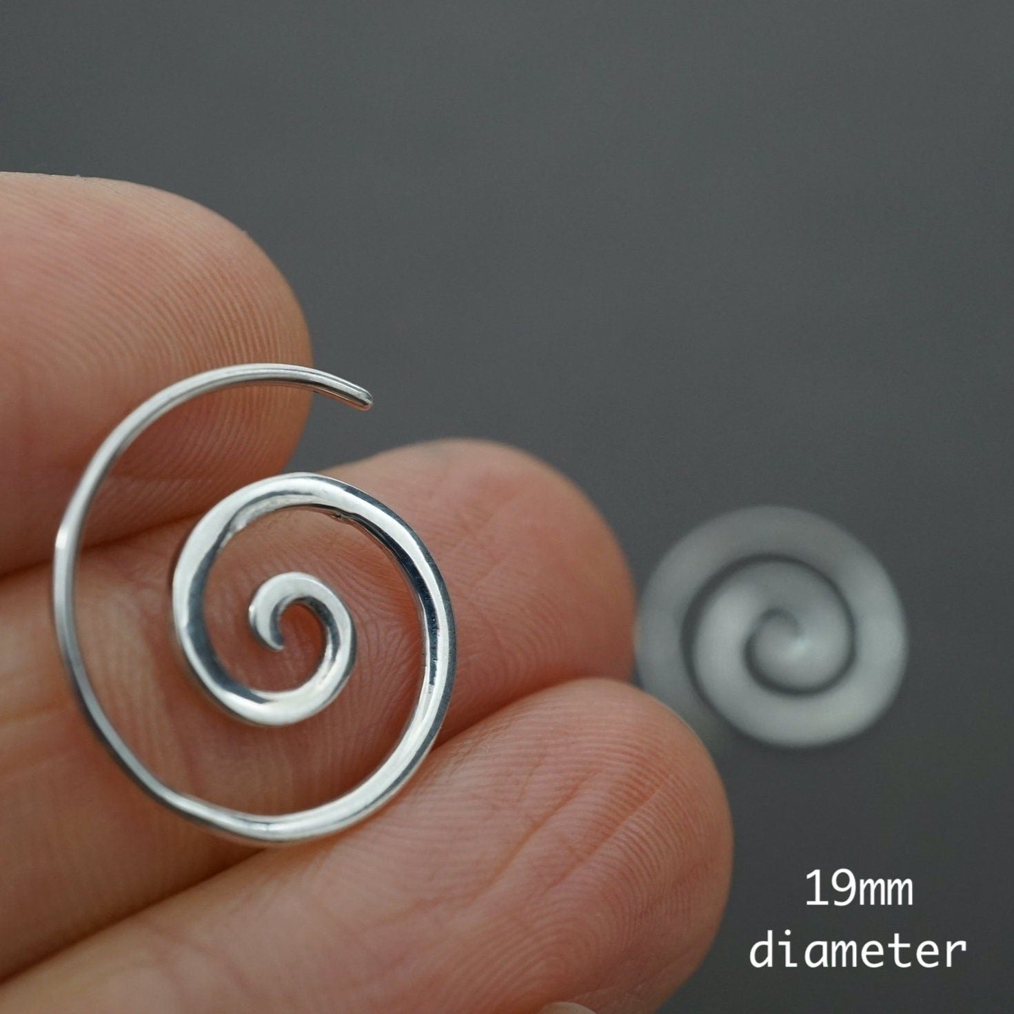 lv spiral earrings